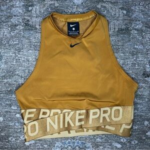 Nike Pro Intertwist Women's Dri-FIT Training Crop Top Gold Women’s Small